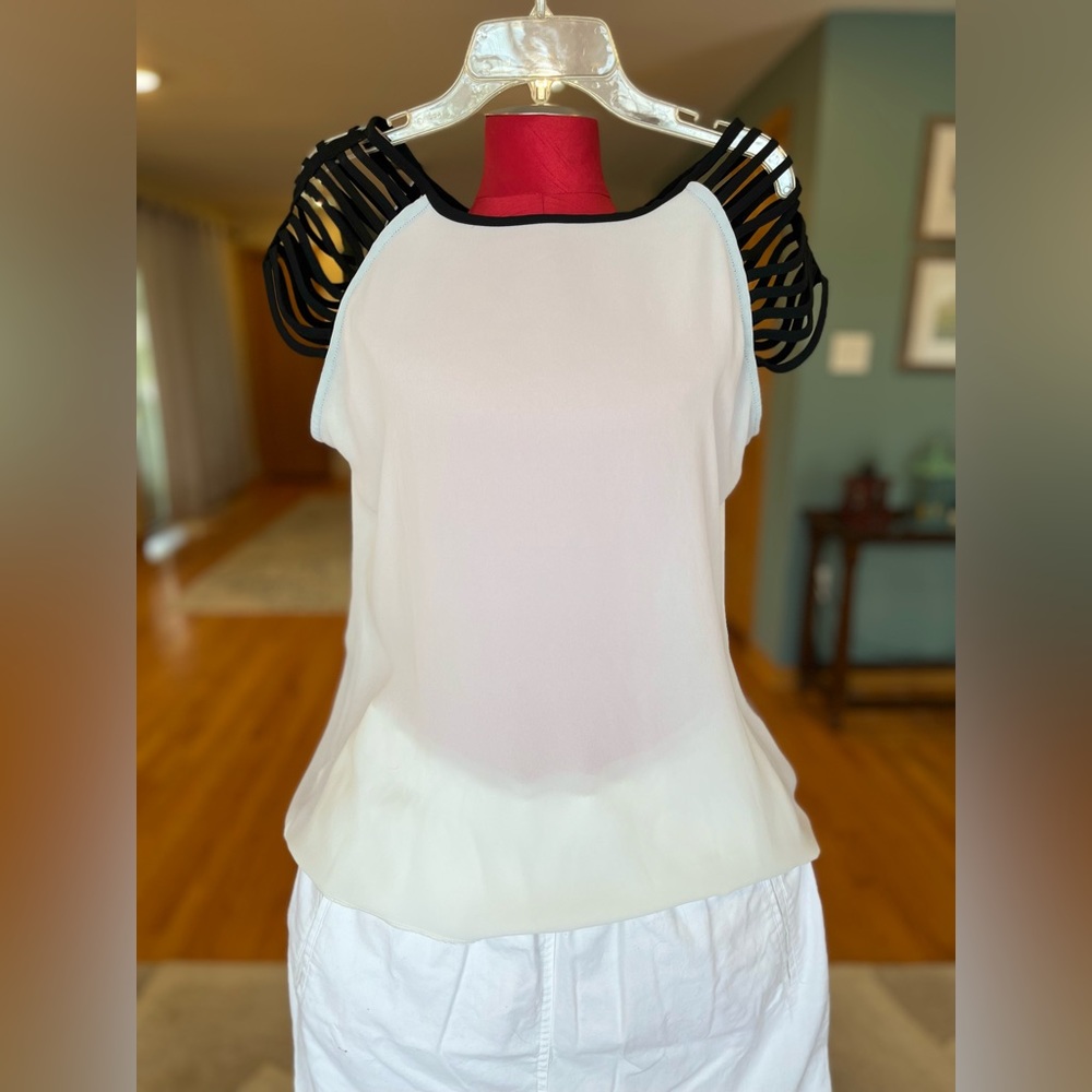 Ivory shell w/ sexy black strappy sleeves from Venus. Medium.
